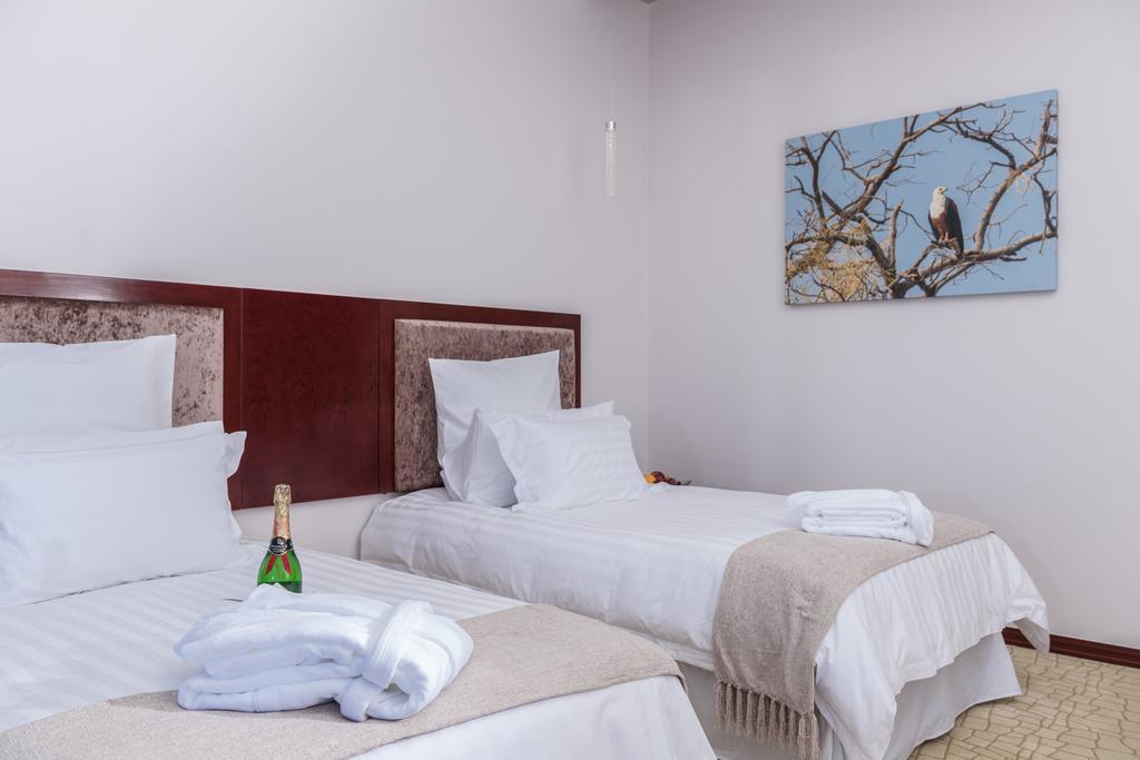 Flamingo Villas Boutique Hotel Уолфиш-Бей Экстерьер фото